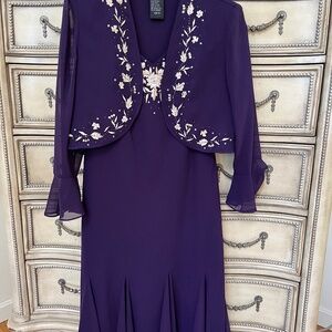 Formal pearl and sequin sleeveless dress with jacket.